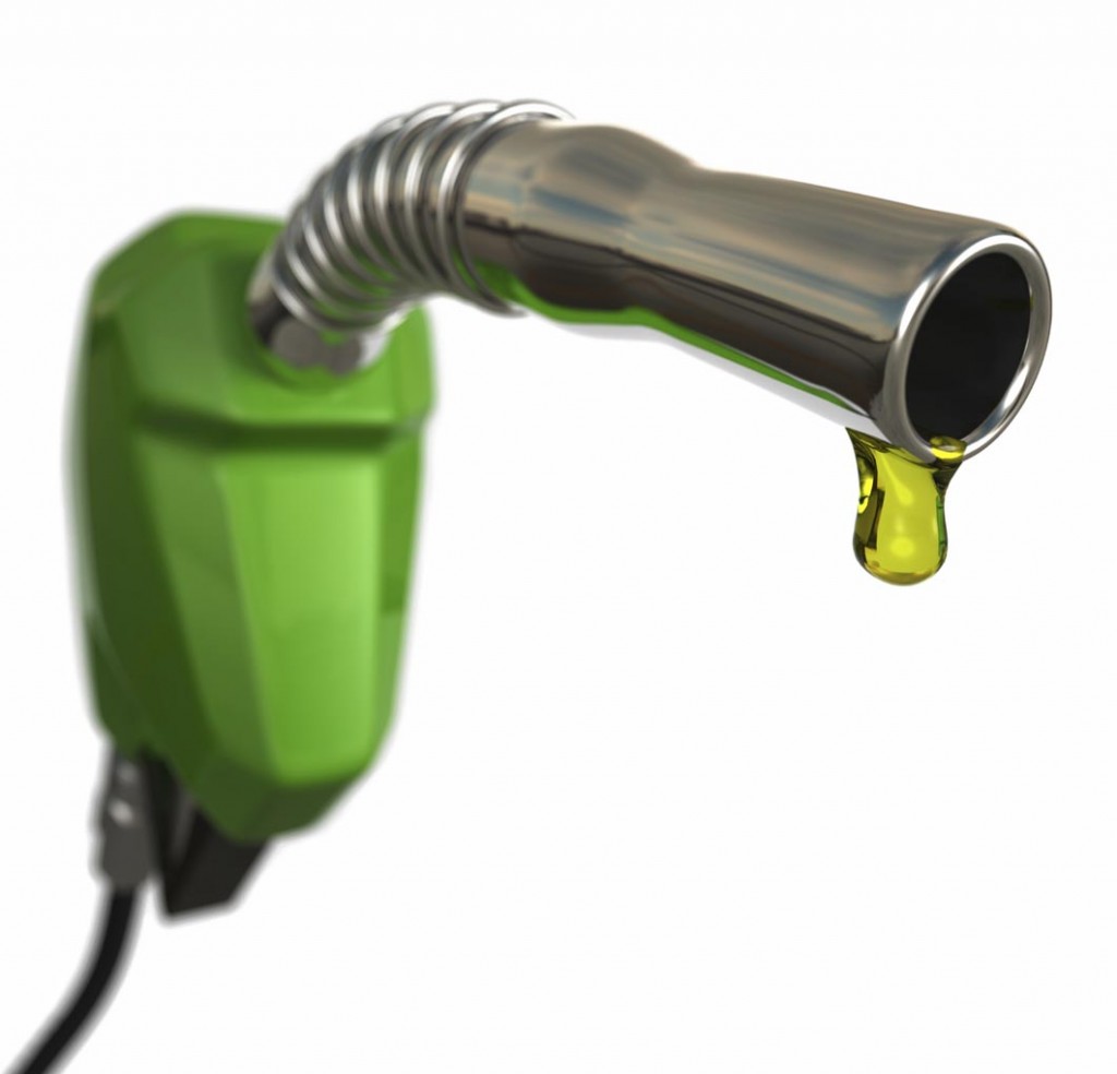 A fuel pump nozzle with a drop of petrol. Very high resolution 3D render.